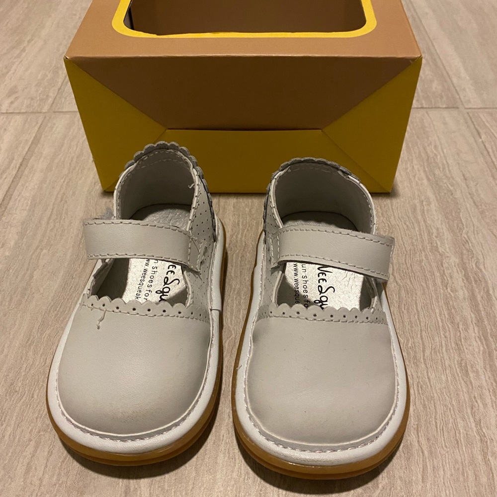 Girl, walking shoes. Never worn. Brand is Wee Squeak.